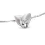 wisiorek złoto białe 750/18 K Diament 0.12 ct, w-si