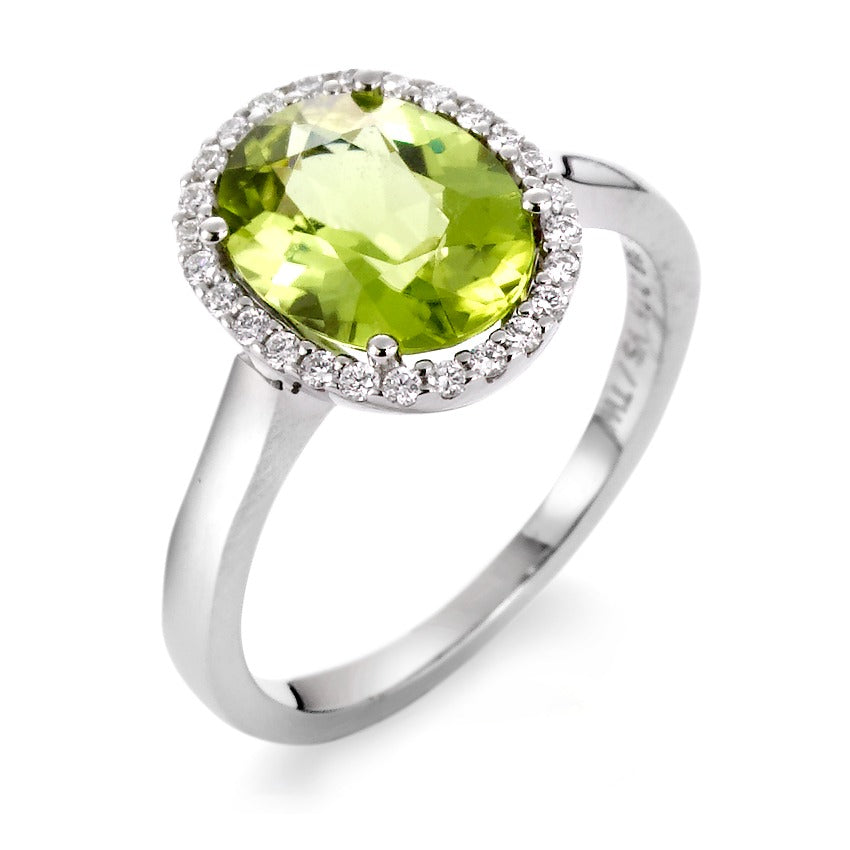 pierścionek złoto białe 750/18 K Perydot zielony, Diament 0.15 ct, 26 kamienie, tw-vsi
