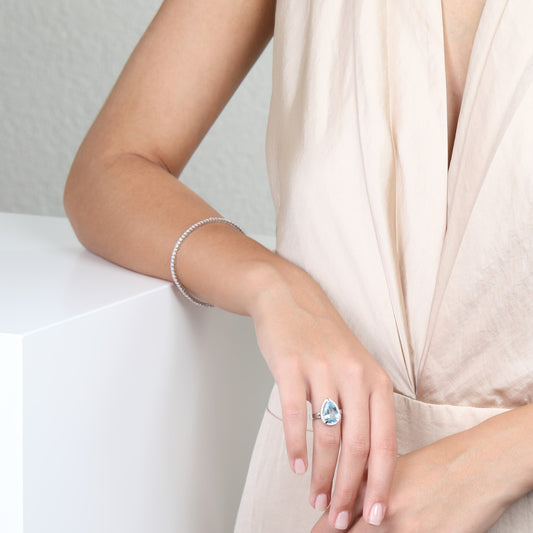 pierścionek złoto białe 750/18 K Topaz, Diament 0.15 ct, 30 kamienie, [Brillant], w-si