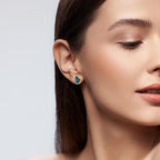 kolczyki wkrętki złoto żółte 750/18 K Topaz London Blue 2 kamienie